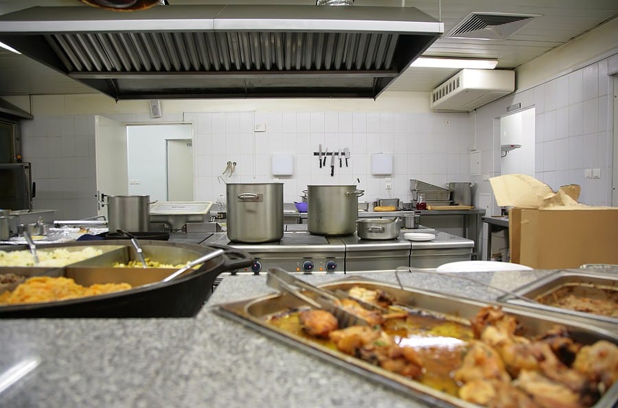 on a modern empty stainless industrial kitchen